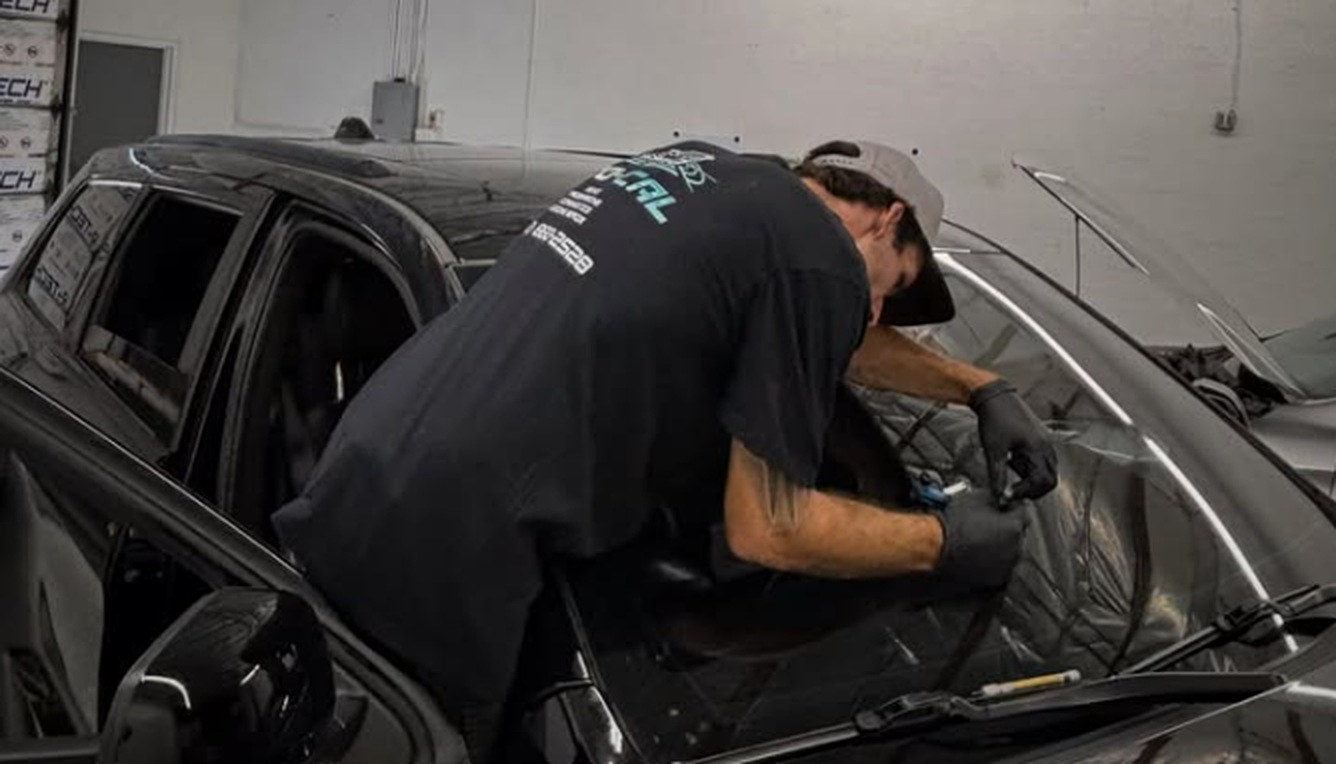 PRO-CAL technician installing auto glass